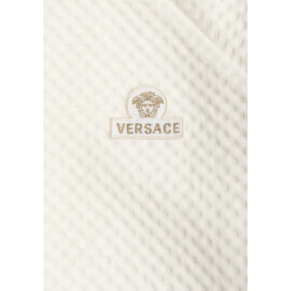 Brodert Matelassé bomullsjersey-sovedress